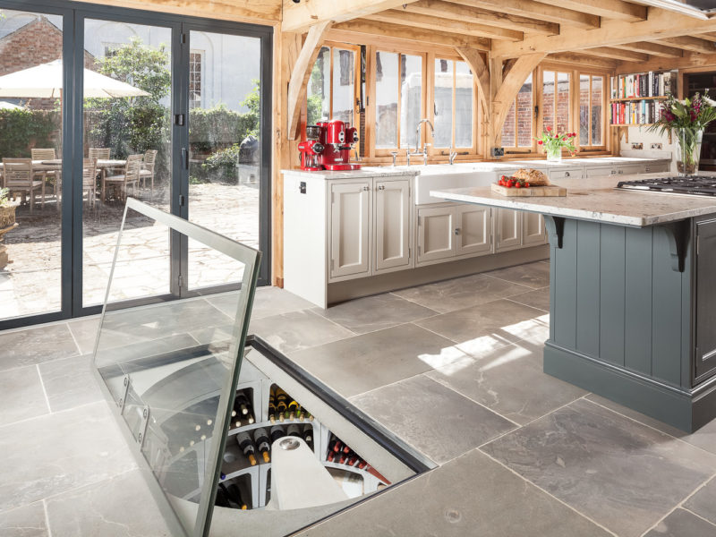 kitchen with bespoke submerged wine cellar