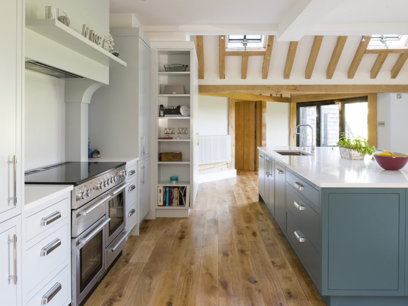 modern country kitchen with wood floor and range cooker