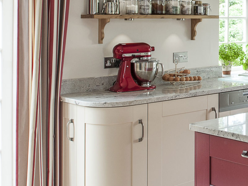 kitchen with curved units and shelving