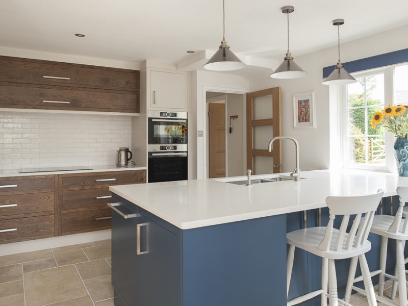 bespoke kitchen with blue island