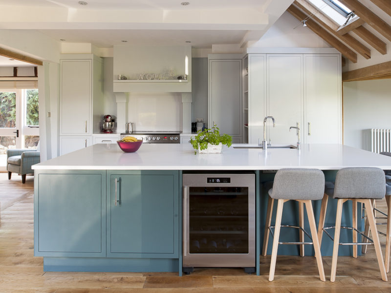 modern country kitchen with wood floor and breakfast bar