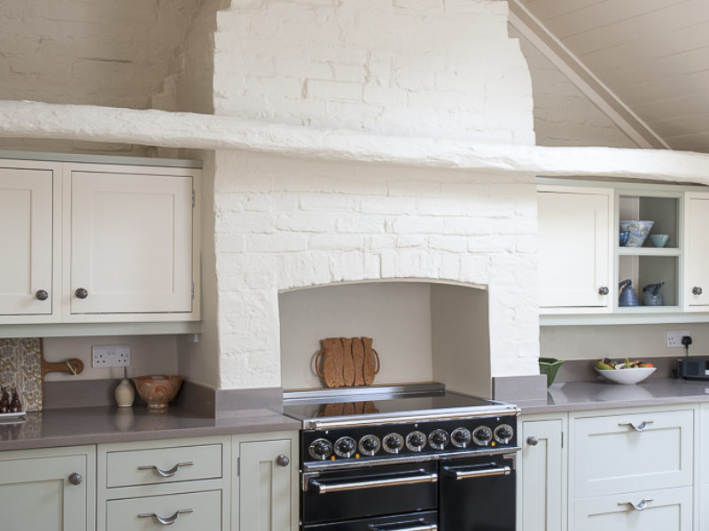 former bakery kitchen with feature brick chimney