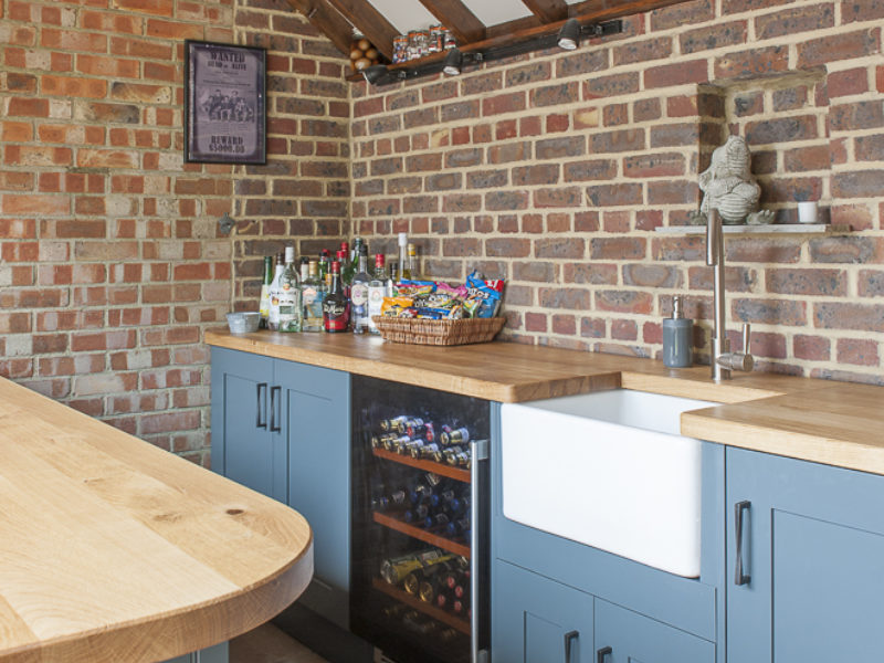 blue bar with brick wall and beams