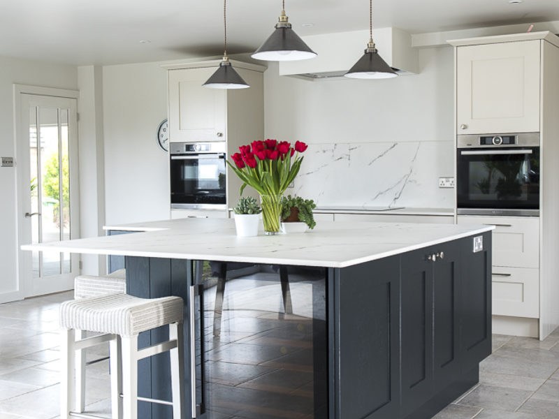 monochrome kitchen island with white stool